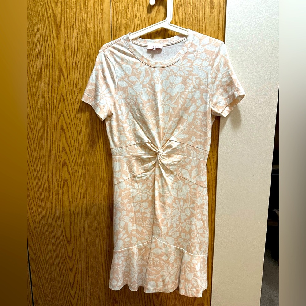 Parker. Pretty romper for your warm winter getaways or keep for our summer days